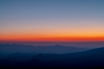 Fototapeta na wymiar Orange sky and mountains