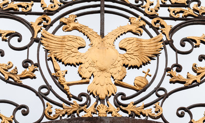 Golden Double Eagle in forged fence