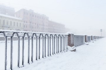 Griboyedov Canal railing at winter day
