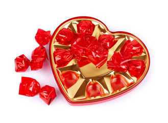 Fototapeta premium Chocolate candy in a heart-shaped box for Valentine's Day on a white background