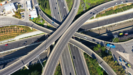 Aerial drone photo of highway multilevel junction interchange crossing road 