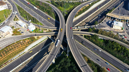 Aerial drone photo of highway multilevel junction interchange crossing road 