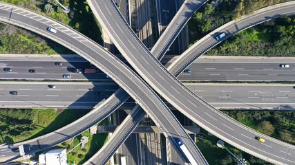Foto op Plexiglas Aerial drone photo of highway multilevel junction interchange crossing road  © aerial-drone