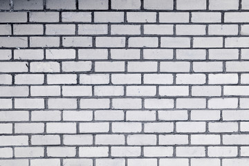 Texture, brick, wall, it can be used as a background . Brick texture with scratches and cracks