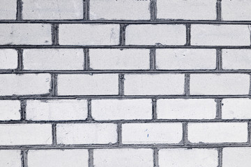 Texture, brick, wall, it can be used as a background . Brick texture with scratches and cracks