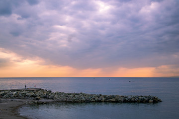 Beautiful sunset at the sea near Boccadasse  Genoa, Italy.