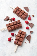 Chocolate ice cream (popsicles) with raspberry 