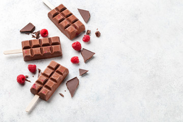 Chocolate ice cream (popsicles) with raspberry 