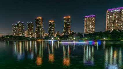 Naklejka na ściany i meble Songdo Central Park at night in Incheon, South Korea