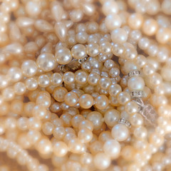 bright white pearls closeup, fashion background