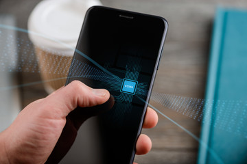 Hand holding a smart phone