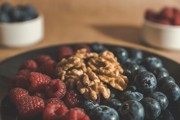 Red fruits with cereals and nuts