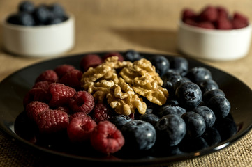 Red fruits with cereals and nuts