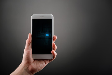 Hand holding a white phone