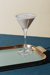 Alexander, an after dinner cocktail with gin or cognac, white creme de cacao, fresh cream and  grated nutmeg