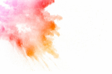 Explosion of multicolored dust on white background. - 250080829