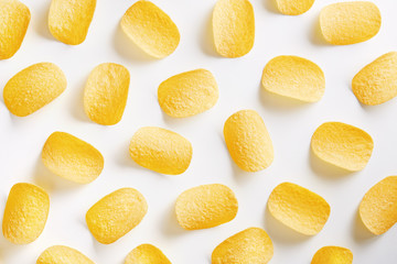 Potato chips pattern on a white background. Top view