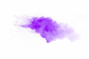 Explosion of violet dust on white background.