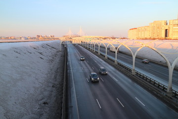 city highway in the winter at sunset