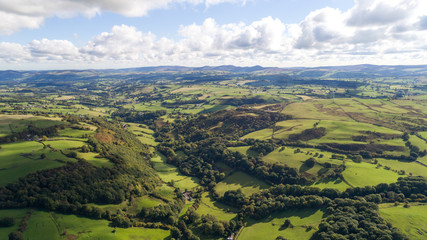 aerial of the rolling welsh hills, fields and farms in snowdonia national park
