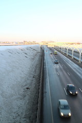 city highway in the winter at sunset