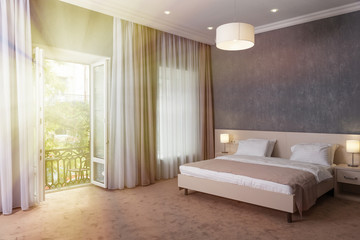 Fototapeta na wymiar Comfort bedroom in luxury style interior the morning