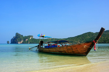 Fototapeta na wymiar Longtail boat anchored at Ao Loh Dalum beach on Phi Phi Don Island, Krabi Province, Thailand