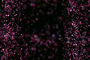 abstract bright colorful violet and red or magenta bokeh frame glitter sparkle blurred background. like molecule spread and absorb.