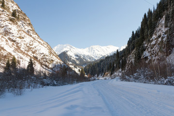 snowy road in the mountains of Ili Alatau