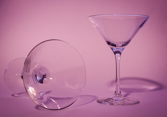two glasses with violet background