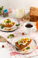 carrot fruit cake with nuts and cream