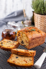 Traditional Italian bread with dried tomatoes and olives. Homemade cakes for lunch and breakfast and ingredients. Free space for text.