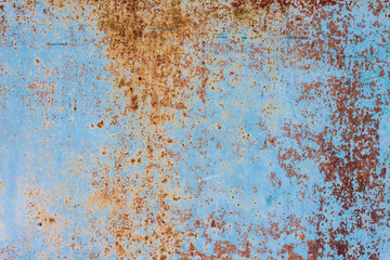 Old rusty metal background with cracked paint