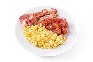 Breakfast with scrambled eggs, bacon and tomatoes isolated on white background