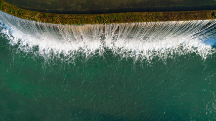 enthusiastic views of the waterfall of water in the spring