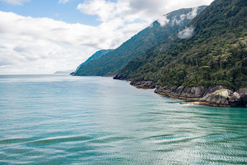 Obraz premium Entry into the Tasman Sea from Milford Sound, Fiordland National Park, South Island, New Zealand