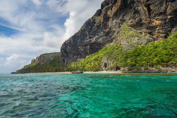Obraz na płótnie Canvas Tropical beach between the rocks. Paradise secluded island. 