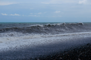 Stormy sea waves breaking near the coast