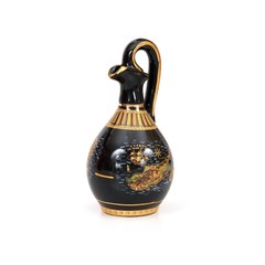 A copy of an ancient Greek black vessel for wine isolated on white background