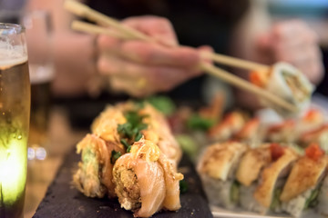 Photo of sushi rolls - Japanese food in restaurant - close-up image