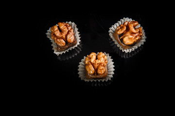 three healthy useful organic handmade candies with walnuts