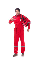 Fototapeta premium Young paramedic in red uniform isolated on white 