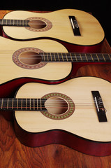 Fototapeta na wymiar Three acoustic guitars.