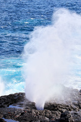Water bursts through blowhole on Espanola Island, Galapagos National park, Ecuador.