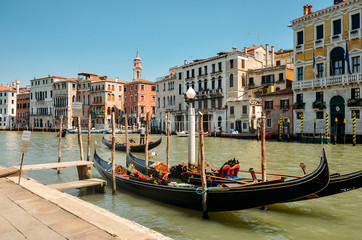 Obraz na płótnie Canvas Gondolas in Venice.Beautiful view of traditional Gondola on Canal Grande with San Giorgio Maggiore church in the background, San Marco, Venice, Italy