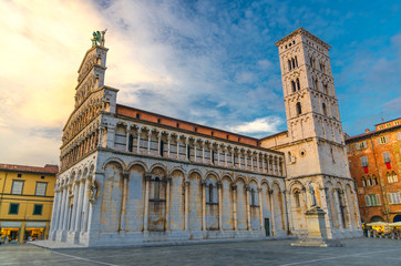Chiesa di San Michele in Foro St Michael Roman Catholic church basilica on Piazza San Michele square in historical centre of old medieval town Lucca, evening view, Tuscany, Italy