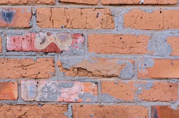 old brick wall with rough masonry