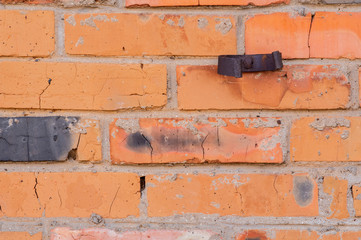 brick wall with iron rusty element