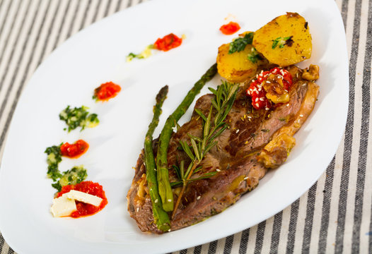 Image of veal with baked vegetables