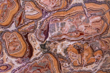 Background from marble texture. Multi-colored inclusions of different rocks. Various forms of inclusions. Panels of interior decoration in retro style.